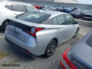 2022 Toyota Prius L Eco with VIN JTDKAMFU0N3181467, listed as a IAAI auction lot 41802679 with 121,749 mi miles. Bid and sale history available at carsss.com. Image 4.