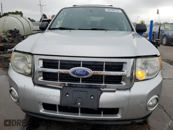 2011 Ford Escape XLT с VIN 1FMCU9DG8BKC62302, выставлен на аукционе Copart как лот 58240715 с пробегом 159 739 миль миль и Списание • Salvage title. История ставок и продаж доступна на DreamBid. Изображение 5.