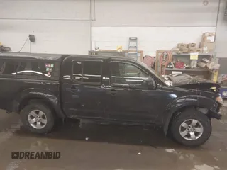 2012 Nissan Frontier SV with VIN 1N6AD0EV3CC426861, listed as a IAAI auction lot 41517120 with 159,491 mi miles and . Bid and sale history available at DreamBid. Image 14.