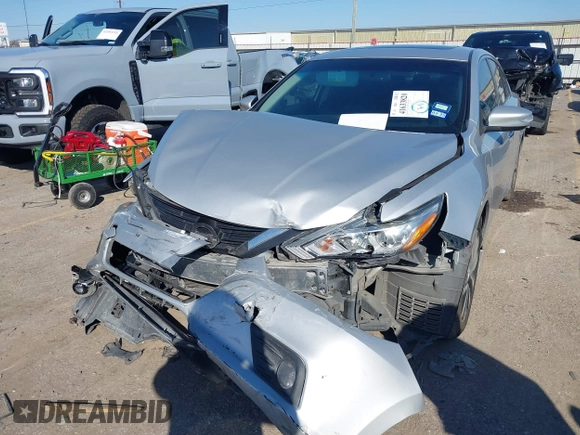 2018 Nissan Altima 2.5 S with VIN 1N4AL3AP0JC140855, listed as a IAAI auction lot 41633820 with 102,716 mi miles. Bid and sale history available at carsss.com. Image 17.