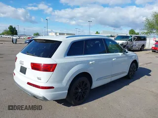 2017 Audi Q7 Premium with VIN WA1AAAF76HD019257, listed as a IAAI auction lot 42292549 with 55,067 mi miles and . Bid and sale history available at DreamBid. Image 4.