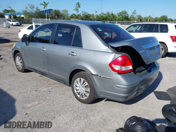 2009 Nissan Versa 1.8 S with VIN 3N1BC11E09L377706, listed as a IAAI auction lot 42027981 with 146,105 mi miles. Bid and sale history available at carsss.com. Image 3.