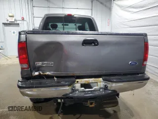 2005 Ford F-350 XL with VIN 1FTWX31P35EB41027, listed as a Copart auction lot 57124585 with 304,957 mi miles and Salvage title. Bid and sale history available at DreamBid. Image 6.