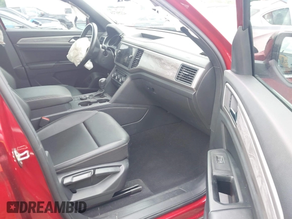 2020 Volkswagen Atlas SE z VIN 1V21E2CA8LC209638, wystawiony jako IAAI lot #42280724 z przebiegiem 79 659 mil mil oraz . Historia ofert i sprzedaży dostępna na DreamBid. Obrazek 5.