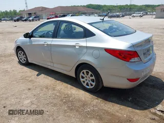 2014 Hyundai Accent GLS z VIN KMHCT4AE1EU637366, wystawiony jako IAAI lot #42455436 z przebiegiem 121 764 mil mil oraz . Historia ofert i sprzedaży dostępna na DreamBid. Obrazek 3.