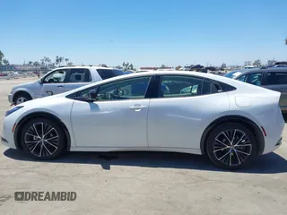 2024 Toyota Prius LE with VIN JTDACAAU2R3020703, listed as a IAAI auction lot 42644240 with 32,715 mi miles and . Bid and sale history available at DreamBid. Image 14.