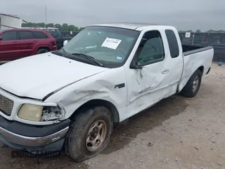 2001 Ford F-150 XL z VIN 1FTZX17281NB02781, wystawiony jako IAAI lot #42377688 z przebiegiem 180 830 mil mil oraz . Historia ofert i sprzedaży dostępna na DreamBid. Obrazek 6.