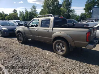 2002 Nissan Frontier SVE with VIN 1N6MD27Y82C392057, listed as a Copart auction lot 63640405 with 167,092 mi miles and Clean title. Bid and sale history available at DreamBid. Image 2.