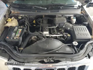 2003 Jeep Grand Cherokee Laredo with VIN 1J4GW48S43C567559, listed as a Copart auction lot 61431595 with 249,998 mi miles and Salvage title. Bid and sale history available at DreamBid. Image 12.