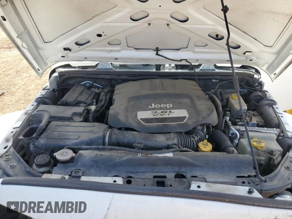 2014 Jeep Wrangler Unlimited Sahara with VIN 1C4BJWEG1EL210949, listed as a Copart auction lot 60977555 with 122,495 mi miles and Salvage title. Bid and sale history available at DreamBid. Image 12.