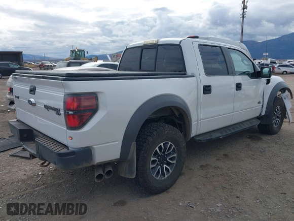 2014 Ford F-150 SVT Raptor with VIN 1FTFW1R62EFC00548, listed as a IAAI auction lot 40706960 with 71,590 mi miles and . Bid and sale history available at carsss.com. Image 4.