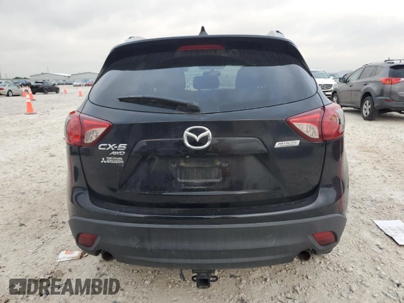 2015 Mazda CX-5 Touring with VIN JM3KE4CYXF0446370, listed as a Copart auction lot 52392575 with 132,419 mi miles and Salvage Title. Bid and sale history available at DreamBid. Image 6.