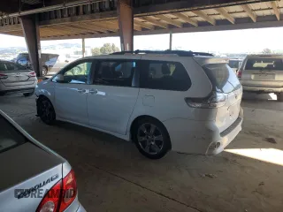 2012 Toyota Sienna SE with VIN 5TDXK3DCXCS196965, listed as a Copart auction lot 46950365 with 141,176 mi miles and Salvage Title. Bid and sale history available at carsss.com. Image 2.