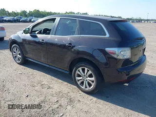 2011 Mazda CX-7 S Touring z VIN JM3ER4CLXB0358063, wystawiony jako IAAI lot #42325445 z przebiegiem 156 206 mil mil oraz . Historia ofert i sprzedaży dostępna na DreamBid. Obrazek 3.