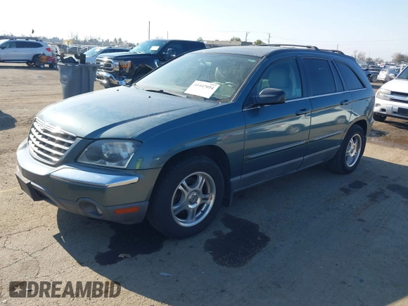 2005 Chrysler Pacifica Touring with VIN 2C4GM68445R651173, listed as a IAAI auction lot 41447054 with 294,074 mi miles and . Bid and sale history available at DreamBid. Image 2.