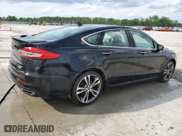 2020 Ford Fusion Titanium with VIN 3FA6P0D90LR192500, listed as a Copart auction lot 53746345 with 135,636 mi miles and Salvage title. Bid and sale history available at DreamBid. Image 3.