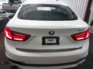 2015 BMW X6 sDrive35i z VIN 5UXKU0C54F0F91660, wystawiony jako IAAI lot #42375390 z przebiegiem 150 209 mil mil oraz . Historia ofert i sprzedaży dostępna na DreamBid. Obrazek 16.