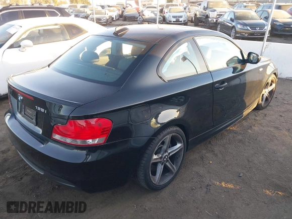 2010 BMW 1 Series 135i with VIN WBAUC7C52AVK81261, listed as a IAAI auction lot 41344077 with 110,745 mi miles and . Bid and sale history available at carsss.com. Image 4.