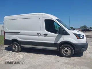 2023 Ford Transit Cargo with VIN 1FTBR2C87PKB38306, listed as a IAAI auction lot 41972454 with 51,049 mi miles and . Bid and sale history available at DreamBid. Image 13.