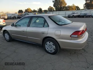 2001 Honda Accord LX z VIN 1HGCG16461A067174, wystawiony jako Copart lot #87543245 z przebiegiem 148 410 mil mil oraz Czysty tytuł • Clean title. Historia ofert i sprzedaży dostępna na DreamBid. Obrazek 2.