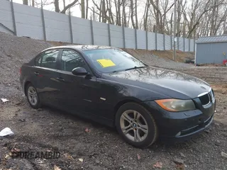 2008 BMW 3 Series 328xi with VIN WBAVC93508K043288, listed as a IAAI auction lot 42060130 with 183,882 mi miles. Bid and sale history available at carsss.com. Image 1.