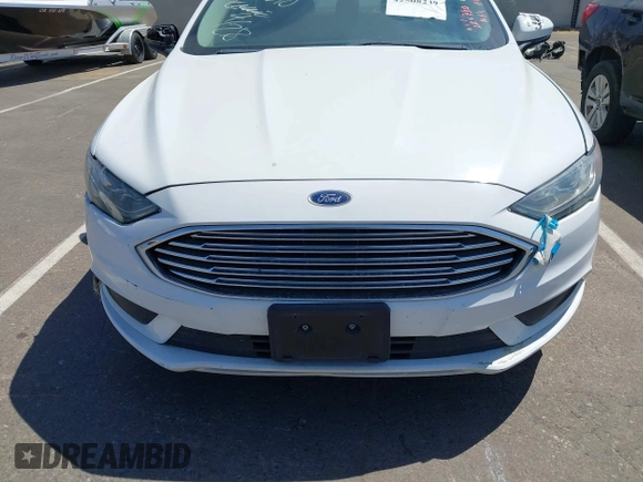 2018 Ford Fusion SE z VIN 3FA6P0LU1JR225930, wystawiony jako IAAI lot #42508239 z przebiegiem 202 272 mil mil oraz . Historia ofert i sprzedaży dostępna na DreamBid. Obrazek 6.