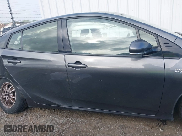 2017 Toyota Prius Plus z VIN JTDKARFP8H3054476, wystawiony jako IAAI lot #41914158 z przebiegiem 146 902 mil mil oraz . Historia ofert i sprzedaży dostępna na DreamBid. Obrazek 14.