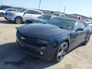2013 Chevrolet Camaro LT z VIN 2G1FC3D33D9134173, wystawiony jako IAAI lot #41954984 z przebiegiem 157 919 mil mil oraz . Historia ofert i sprzedaży dostępna na DreamBid. Obrazek 2.