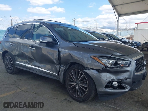 2019 Infiniti QX60 Pure z VIN 5N1DL0MN3KC565998, wystawiony jako IAAI lot #41911130 z przebiegiem 79 463 mil mil oraz . Historia ofert i sprzedaży dostępna na DreamBid. Obrazek 6.