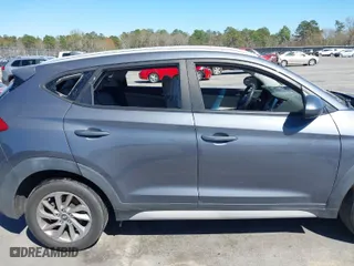 2018 Hyundai Tucson SEL with VIN KM8J3CA48JU718402, listed as a IAAI auction lot 41810363 with 218,853 mi miles. Bid and sale history available at carsss.com. Image 17.