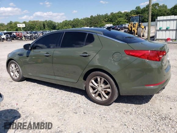 2013 Kia Optima EX с VIN 5XXGN4A77DG108218, выставлен на аукционе Copart как лот 57728815 с пробегом 162 475 миль миль и Списание • Salvage title. История ставок и продаж доступна на DreamBid. Изображение 2.