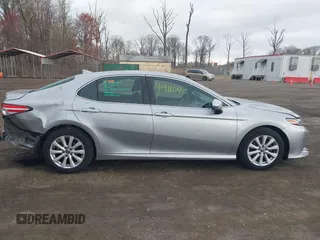 2019 Toyota Camry LE z VIN 4T1B11HK9KU851075, wystawiony jako IAAI lot #41911090 z przebiegiem 114 762 mil mil oraz . Historia ofert i sprzedaży dostępna na DreamBid. Obrazek 13.