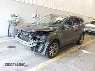 2016 Ford Escape Titanium with VIN 1FMCU9J92GUB63525, listed as a IAAI auction lot 41469824 with 156,773 mi miles. Bid and sale history available at carsss.com. Image 22.
