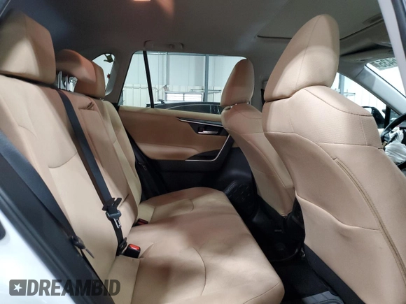 2019 Toyota RAV4 Hybrid XLE with VIN 2T3RWRFV1KW016526, listed as a Copart auction lot 61466435 with 64,255 mi miles and Salvage title. Bid and sale history available at DreamBid. Image 11.
