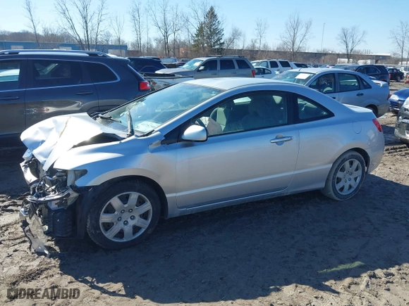 2010 Honda Civic Cpe LX with VIN 2HGFG1B69AH516479, listed as a IAAI auction lot 41757904 with 175,185 mi miles. Bid and sale history available at carsss.com. Image 2.