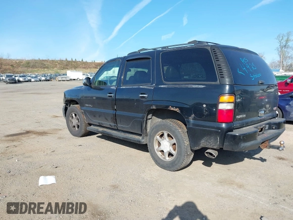 2005 GMC Yukon Denali z VIN 1GKEK63U55J254214, wystawiony jako IAAI lot #42103378 z przebiegiem 131 183 mil mil oraz . Historia ofert i sprzedaży dostępna na DreamBid. Obrazek 3.