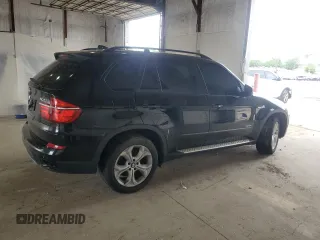 2013 BMW X5 xDrive50i z VIN 5UXZV8C54D0C16780, wystawiony jako Copart lot #57636035 z przebiegiem 137 189 mil mil oraz Tytuł czysty. Historia ofert i sprzedaży dostępna na DreamBid. Obrazek 3.