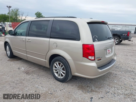 2014 Dodge Grand Caravan SXT z VIN 2C4RDGCG2ER372983, wystawiony jako IAAI lot #42369214 z przebiegiem 148 756 mil mil oraz . Historia ofert i sprzedaży dostępna na DreamBid. Obrazek 3.