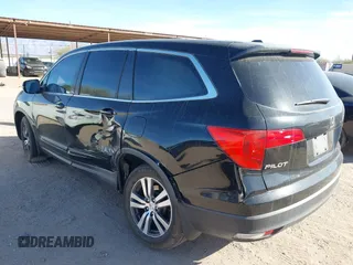 2017 Honda Pilot EX-L with VIN 5FNYF6H54HB063619, listed as a IAAI auction lot 41545415 with Not Provided miles and . Bid and sale history available at DreamBid. Image 3.