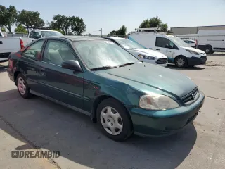 1999 Honda Civic EX with VIN 1HGEJ8243XL083130, listed as a Copart auction lot 60248885 with 331,458 mi miles and Salvage title. Bid and sale history available at DreamBid. Image 4.