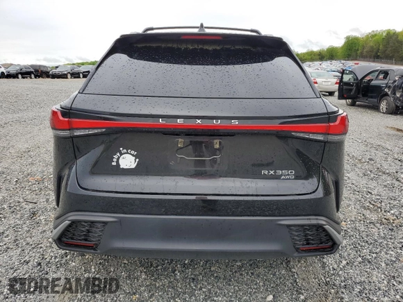 2023 Lexus RX 350 with VIN 2T2BAMCA7PC004804, listed as a Copart auction lot 51845555 with 24,797 mi miles and Salvage Title. Bid and sale history available at DreamBid. Image 6.