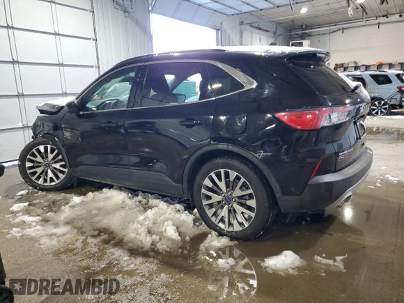 2021 Ford Escape Titanium with VIN 1FMCU9J91MUA57451, listed as a Copart auction lot 44678135 with 74,795 mi miles and Salvage title. Bid and sale history available at DreamBid. Image 2.