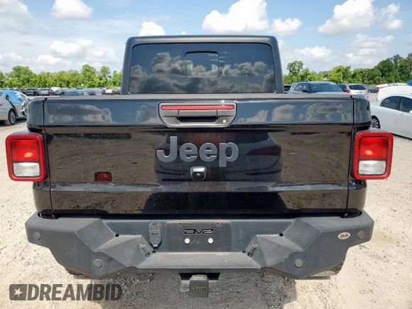 2021 Jeep Gladiator Freedom with VIN 1C6HJTAG8ML580882, listed as a Copart auction lot 57690885 with Not provided miles and Salvage title. Bid and sale history available at DreamBid. Image 6.