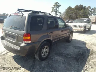 2006 Ford Escape Hybrid with VIN 1FMCU95H26KD48928, listed as a IAAI auction lot 41665769 with 173,313 mi miles. Bid and sale history available at carsss.com. Image 4.