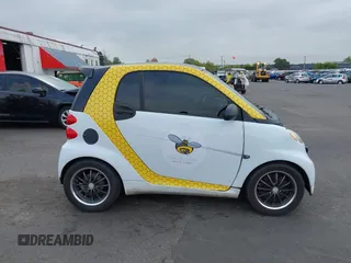 2008 Smart fortwo Pure z VIN WMEEJ31X18K126191, wystawiony jako IAAI lot #42045070 z przebiegiem 149 361 mil mil oraz . Historia ofert i sprzedaży dostępna na DreamBid. Obrazek 14.