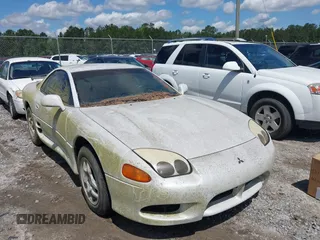 1997 Mitsubishi 3000GT z VIN JA3AM44H8VY006247, wystawiony jako IAAI lot #42233155 z przebiegiem 135 479 mil mil oraz . Historia ofert i sprzedaży dostępna na DreamBid. Obrazek 6.