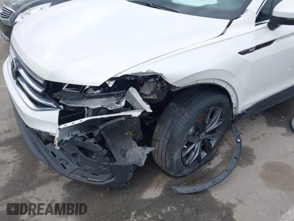 2023 Volkswagen Tiguan SE with VIN 3VVMB7AX0PM036876, listed as a IAAI auction lot 42023415 with 42,003 mi miles and . Bid and sale history available at DreamBid. Image 6.