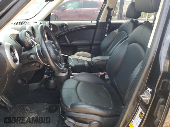 2012 MINI Countryman S with VIN WMWZC3C59CWL87444, listed as a Copart auction lot 59547785 with 147,814 mi miles and Salvage title. Bid and sale history available at DreamBid. Image 7.