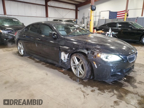 2015 BMW 6 Series 640i xDrive z VIN WBA6B8C58FD453159, wystawiony jako Copart lot #88931285 z przebiegiem 145 656 mil mil oraz Szkoda całkowita • Salvage title. Historia ofert i sprzedaży dostępna na DreamBid. Obrazek 4.