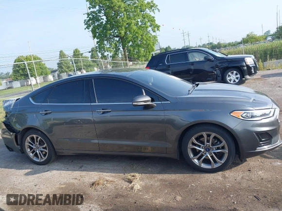 2020 Ford Fusion SEL with VIN 3FA6P0CD9LR229470, listed as a IAAI auction lot 42518855 with 67,088 mi miles and . Bid and sale history available at DreamBid. Image 13.